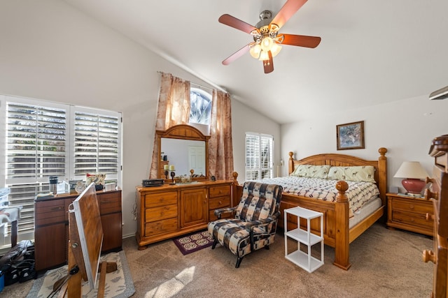 125 Terrace Ln E, Kerrville, TX 78028 - bedroom featuring vaulted ceiling, light carpet, and a ceiling fan