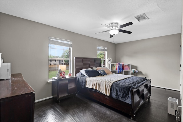 14314 Strutton Dr, Sugar Land, TX 77498 - bedroom featuring baseboards, wood finished floors, and a ceiling fan