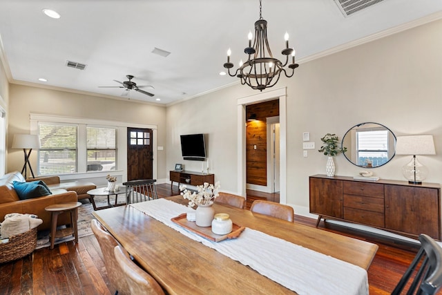 807 Vincent St, Houston, TX 77009 - dining space featuring dark wood finished floors, ceiling fan, a chandelier, recessed lighting, and crown molding