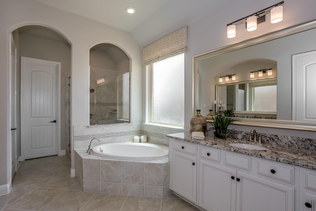 17333 July Moon Ln, Conroe, TX 77302 - bathroom with a bath, vanity, tile patterned flooring, a tile shower, and recessed lighting