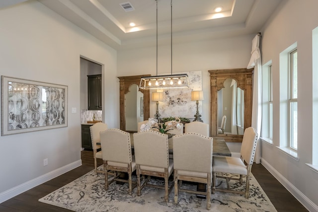 17333 July Moon Ln, Conroe, TX 77302 - dining room with a tray ceiling, dark wood-style flooring, a chandelier, baseboards, and recessed lighting