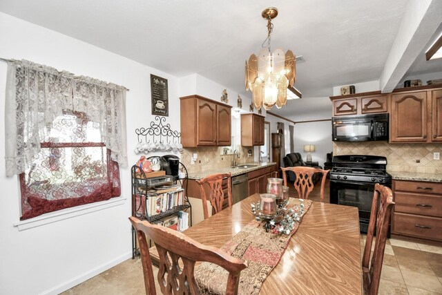 1110 E Brown Ln, Deer Park, TX 77536 - dining space featuring a chandelier