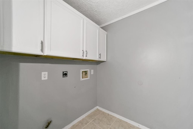 1211 Peacham Ct, Fresno, TX 77545 - laundry area featuring electric dryer hookup, cabinet space, hookup for a washing machine, a textured ceiling, and baseboards