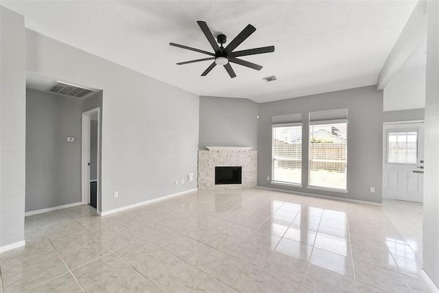 1211 Peacham Ct, Fresno, TX 77545 - unfurnished living room featuring healthy amount of natural light, ceiling fan, a fireplace, baseboards, and a textured ceiling