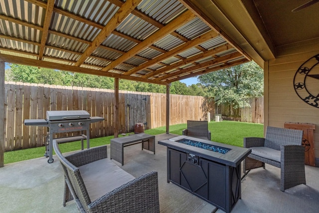 28987 Birch Green Way, Spring, TX 77386 - fenced backyard with an outdoor fire pit, a patio, and grilling area