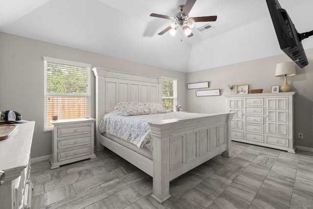 28987 Birch Green Way, Spring, TX 77386 - bedroom with vaulted ceiling, multiple windows, baseboards, and light marble finish floors