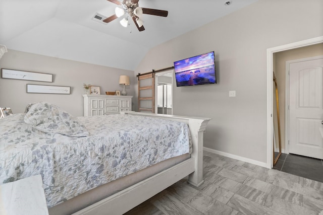 28987 Birch Green Way, Spring, TX 77386 - bedroom with lofted ceiling, baseboards, a barn door, and a ceiling fan