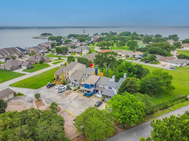 2304 Keel Ct, Willis, TX 77318 - aerial perspective of suburban area featuring a large body of water