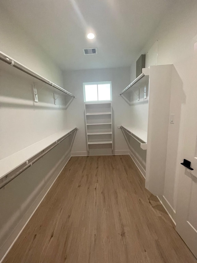 6412 Highland Pine Ln, Houston, TX 77091 - spacious closet featuring wood finished floors