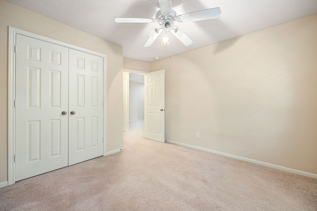 6352 Austinville Dr, Katy, TX 77449 - unfurnished bedroom with carpet floors, baseboards, a closet, and ceiling fan