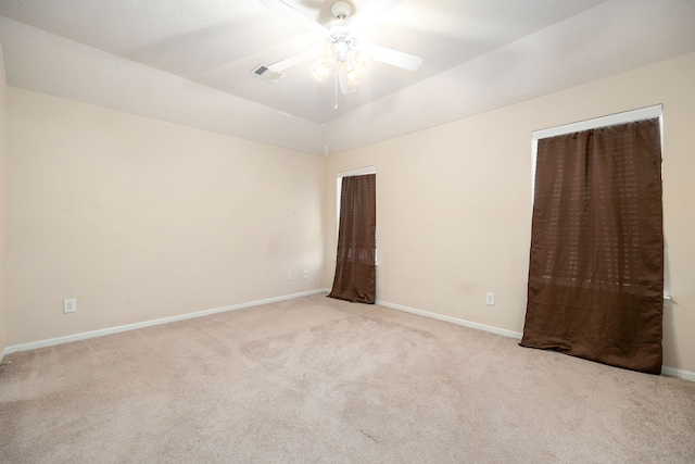 6352 Austinville Dr, Katy, TX 77449 - unfurnished bedroom featuring light carpet, baseboards, ceiling fan, and lofted ceiling