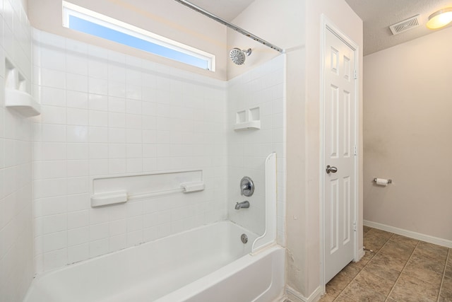 6352 Austinville Dr, Katy, TX 77449 - bathroom with tub / shower combination and baseboards