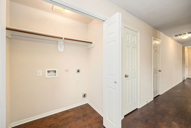 6352 Austinville Dr, Katy, TX 77449 - laundry area with electric dryer hookup, gas dryer hookup, dark wood-style flooring, washer hookup, and baseboards