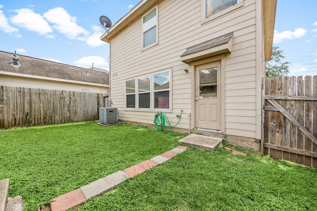 6352 Austinville Dr, Katy, TX 77449 - rear view of property featuring cooling unit
