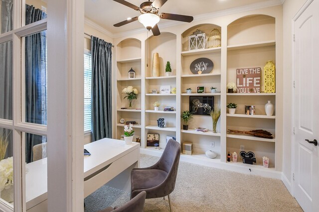 2800 Spencer Ct, Pearland, TX 77089 - carpeted home office with ornamental molding, a ceiling fan, and built in shelves