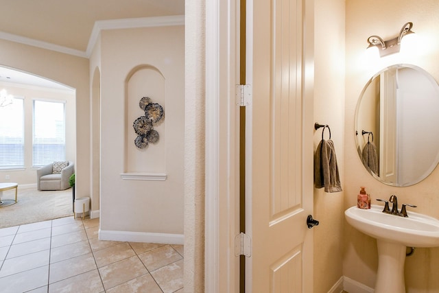 2800 Spencer Ct, Pearland, TX 77089 - bathroom featuring crown molding, tile patterned floors, and baseboards