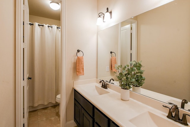 2800 Spencer Ct, Pearland, TX 77089 - bathroom featuring double vanity, toilet, tile patterned floors, and curtained shower