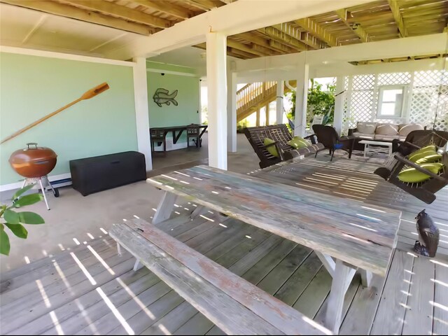 22201 Matagorda Dr, Galveston, TX 77554 - wooden deck with outdoor lounge area