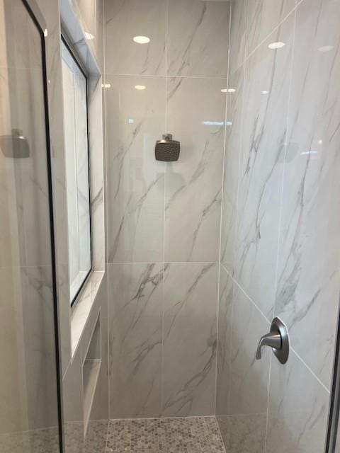 10255 S Goshawk Trl, Conroe, TX 77385 - bathroom featuring a marble finish shower