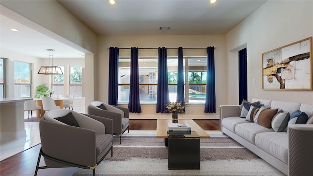 10255 S Goshawk Trl, Conroe, TX 77385 - living room featuring wood finished floors, recessed lighting, baseboards, and a chandelier