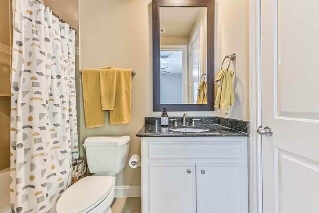 2425 Polk St, Houston, TX 77003 - bathroom with vanity, toilet, and shower / bath combination with curtain