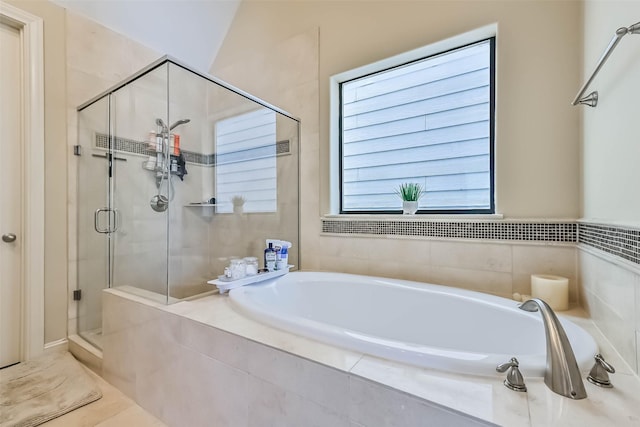 2425 Polk St, Houston, TX 77003 - full bath with a stall shower and a bath
