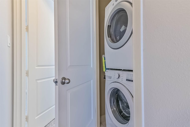 2425 Polk St, Houston, TX 77003 - washroom featuring stacked washer and clothes dryer