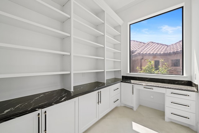 91 Lake Sterling Gate Dr, Spring, TX 77379 - unfurnished office with built in desk and light tile patterned flooring