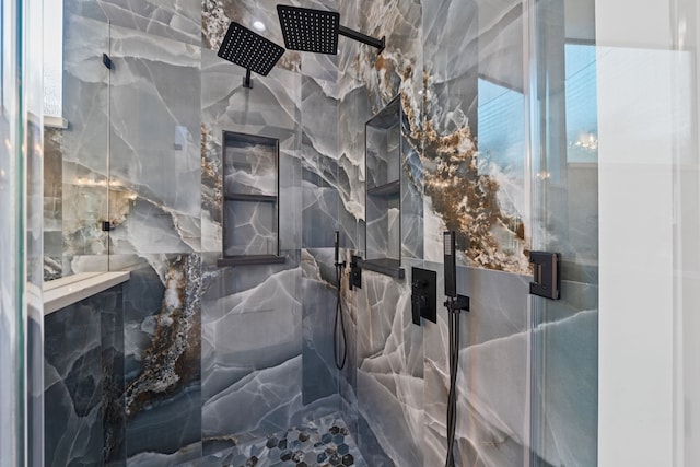91 Lake Sterling Gate Dr, Spring, TX 77379 - bathroom featuring a marble finish shower