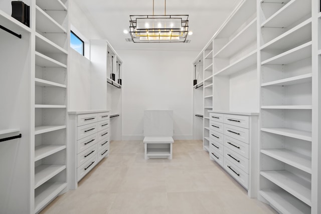 91 Lake Sterling Gate Dr, Spring, TX 77379 - spacious closet featuring a chandelier
