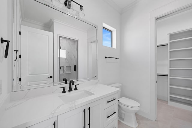 91 Lake Sterling Gate Dr, Spring, TX 77379 - bathroom featuring vanity, a marble finish shower, toilet, crown molding, and a walk in closet