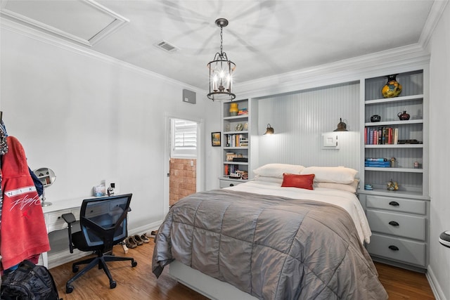 17265 Fm 2154, College Station, TX 77845 - bedroom featuring crown molding, wood finished floors, baseboards, and ensuite bath
