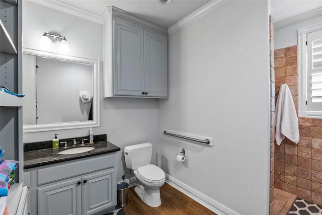 17265 Fm 2154, College Station, TX 77845 - full bath with vanity, toilet, crown molding, tiled shower, and baseboards