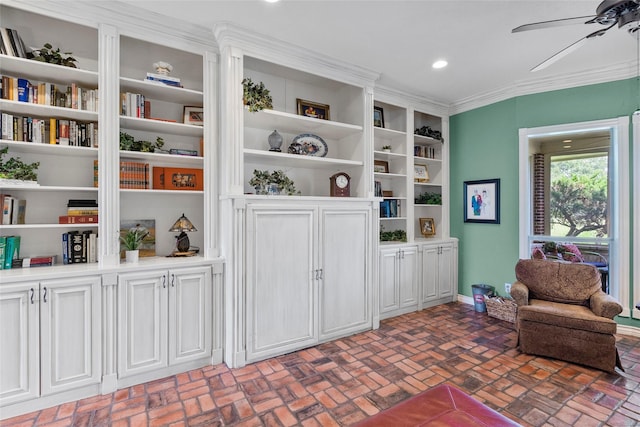 17265 Fm 2154, College Station, TX 77845 - sitting room with brick patterned flooring, ceiling fan, baseboards, crown molding, and recessed lighting