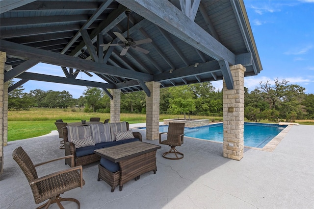 17265 Fm 2154, College Station, TX 77845 - view of patio / terrace with a gazebo, a ceiling fan, an outdoor pool, an in-ground hot tub, and view of wooded area