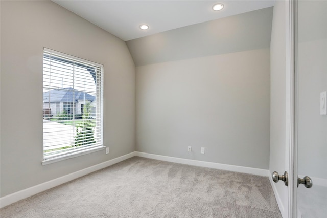 2818 Tanager Trce, Katy, TX 77493 - unfurnished room with healthy amount of natural light, carpet flooring, vaulted ceiling, and recessed lighting
