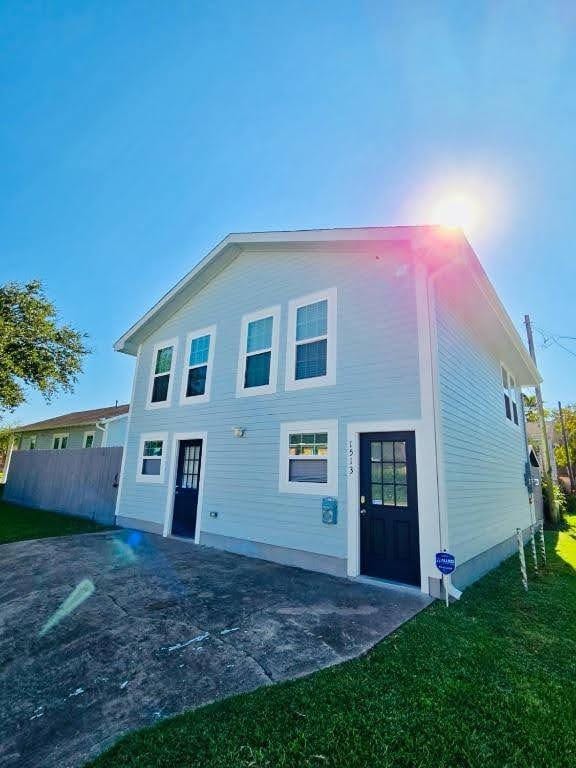 1513 47th St, Galveston, TX 77551 - view of front of home featuring a patio area