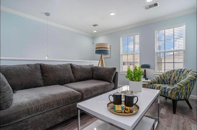1513 47th St, Galveston, TX 77551 - living room with crown molding, dark wood-type flooring, recessed lighting, and baseboards
