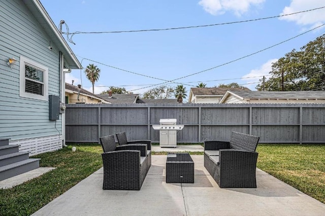1513 47th St, Galveston, TX 77551 - view of patio / terrace featuring a grill