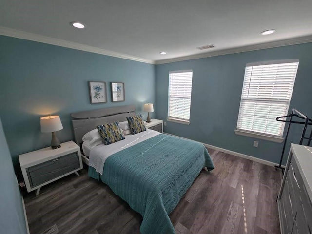 1513 47th St, Galveston, TX 77551 - bedroom featuring ornamental molding, recessed lighting, baseboards, and dark wood-style floors