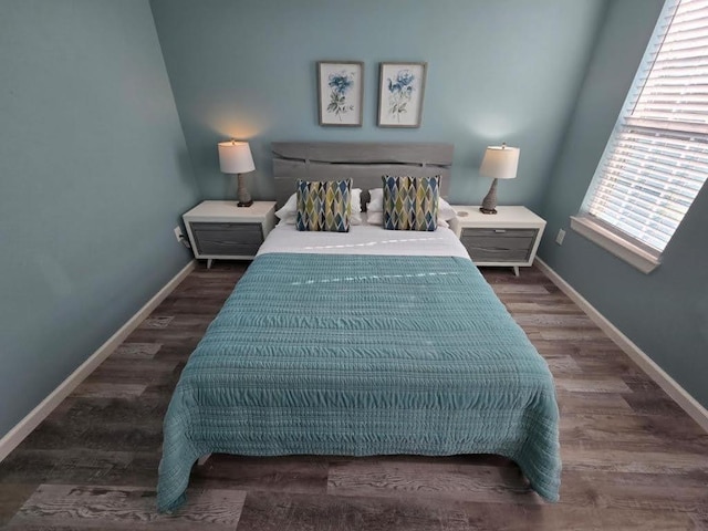 1513 47th St, Galveston, TX 77551 - bedroom featuring baseboards and wood finished floors