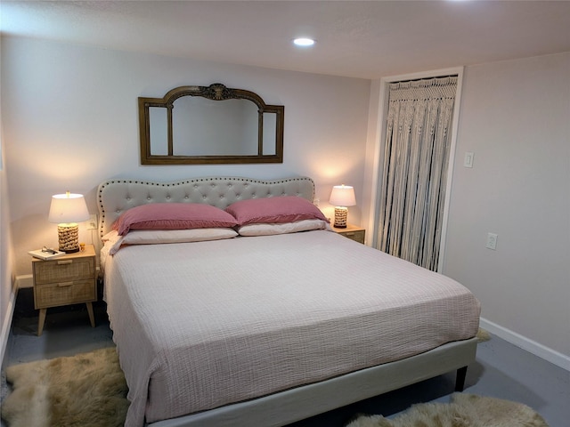 1513 47th St, Galveston, TX 77551 - bedroom featuring finished concrete floors, baseboards, and recessed lighting