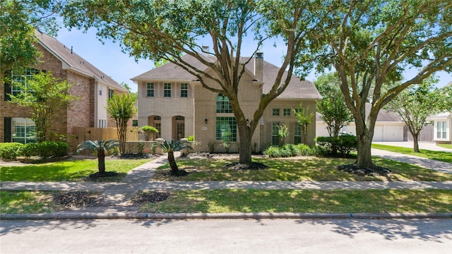 19203 Allview Ln, Houston, TX 77094 - colonial house with brick siding and a chimney