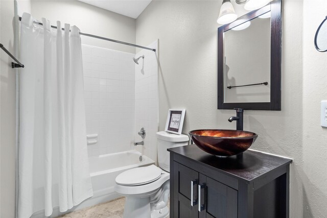 19203 Allview Ln, Houston, TX 77094 - full bath featuring shower / bath combination with curtain, toilet, vanity, and a textured wall
