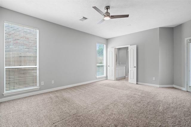 19203 Allview Ln, Houston, TX 77094 - unfurnished bedroom with light colored carpet, baseboards, and ceiling fan
