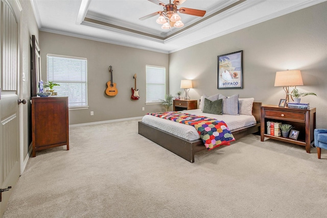 2707 Colony Creek Dr, Bryan, TX 77808 - bedroom featuring crown molding, a raised ceiling, carpet flooring, baseboards, and ceiling fan