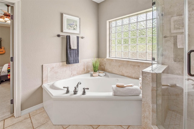 2707 Colony Creek Dr, Bryan, TX 77808 - full bath with a garden tub, a stall shower, tile patterned floors, and ensuite bathroom