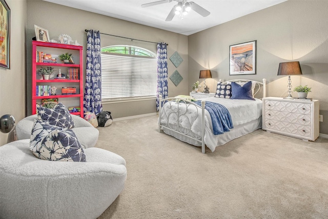 2707 Colony Creek Dr, Bryan, TX 77808 - carpeted bedroom with baseboards and a ceiling fan