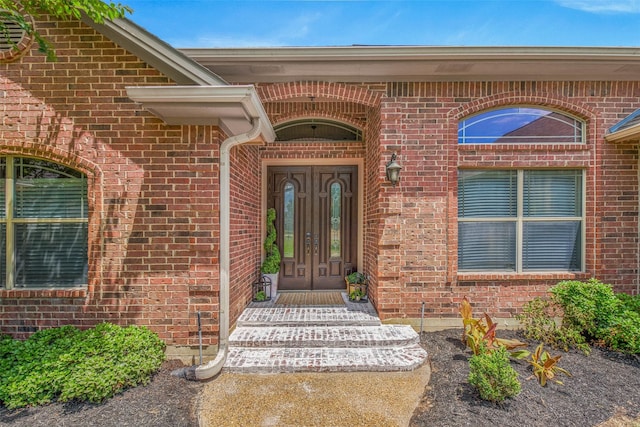 2707 Colony Creek Dr, Bryan, TX 77808 - doorway to property featuring french doors and brick siding