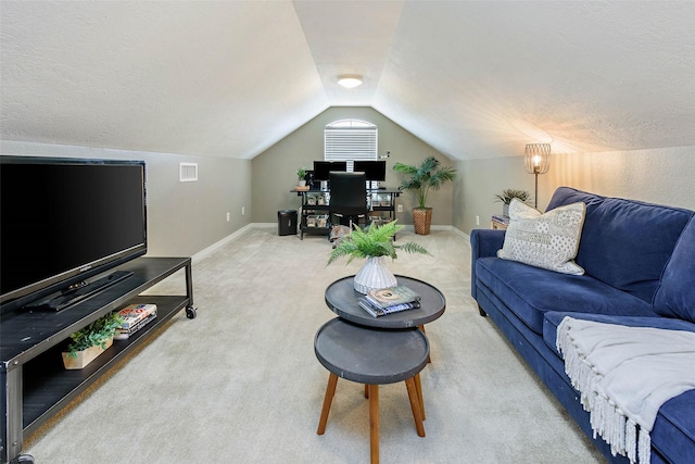 2707 Colony Creek Dr, Bryan, TX 77808 - living room featuring lofted ceiling, carpet flooring, baseboards, and an office area